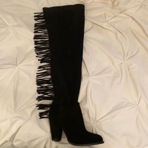 Knee high boots with fringe